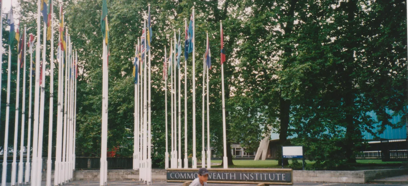 Entrance to Commonwealth Institute site from Kensington High Street with Sylvia Crowe flagpoles, August 2002 (Photo: Sally Williams)