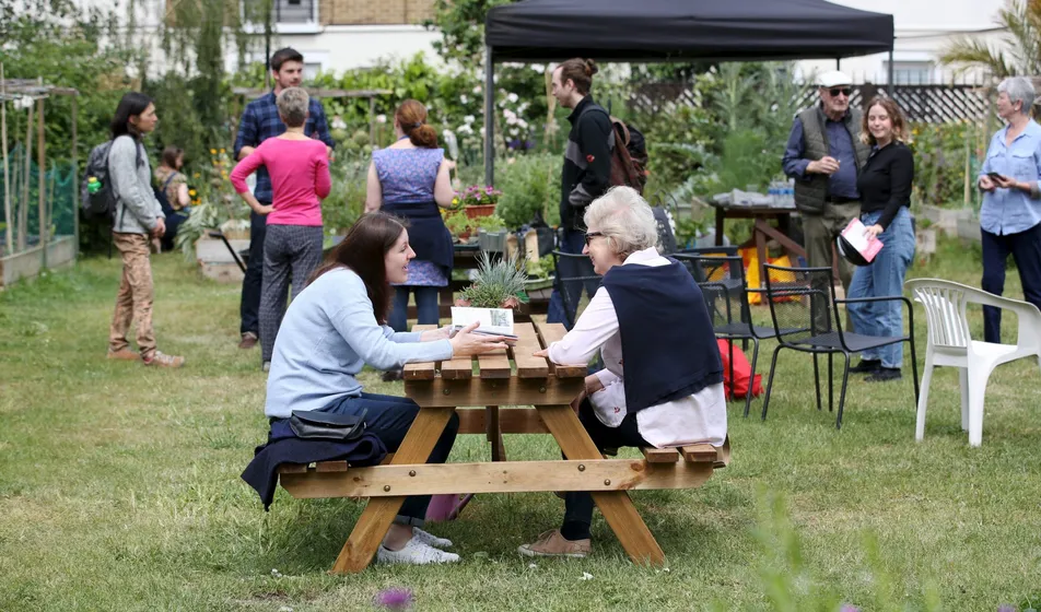 Members of London Parks & Gardens socialising at a garden event